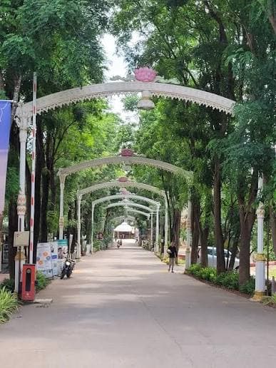 Lush gardens and lake walking paths at Ashram