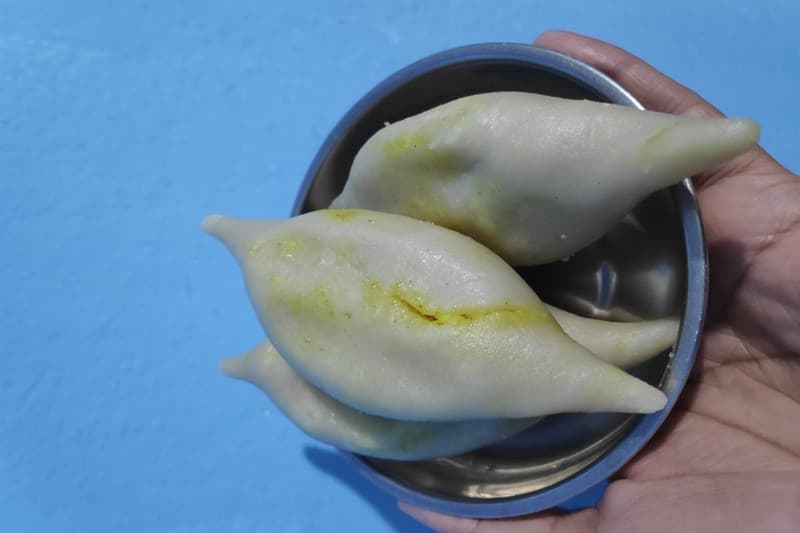 Authentic steamed Bihari Dal Pitha rice dumplings stuffed with spiced chana dal paste